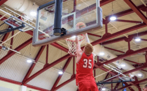 St. Paul’s basketball player #35 dunks during game action