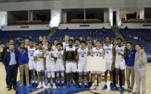 Blue Ridge basketball team poses with state championship plaque and bracket