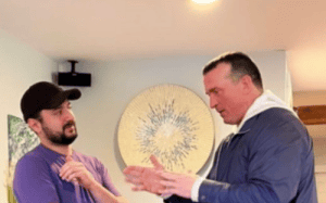 Chris Herren having a one-on-one conversation about recovery at Herren Wellness.