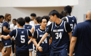 Millbrook basketball players shaking hands after a game in sportsmanship display