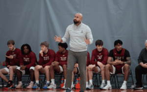 Coach Shavar Bernier instructs his Taft basketball team from the sideline.