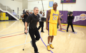 Tim DiFrancesco with Kobe Bryant during Lakers practice, highlighting recovery and training focus. 