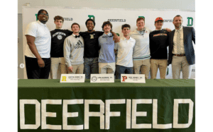 Deerfield Academy student-athletes from the Class of 2024 pose with coaches during College Signing Day, celebrating commitments to schools including Rochester, Bowdoin, and Middlebury.