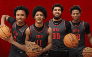 Hun School basketball seniors pose in red and black uniforms holding basketballs before their final home game of the 2025 season.